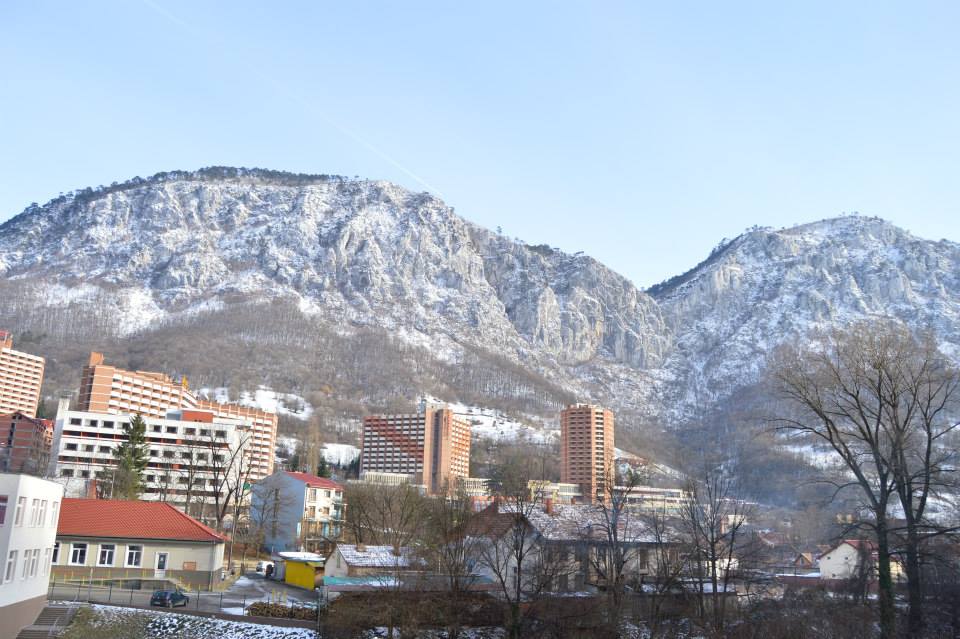 New town centre with comunist era hotels and Domogled Mountains